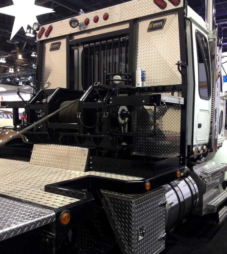 Custom truck body with diamond plate and a winch